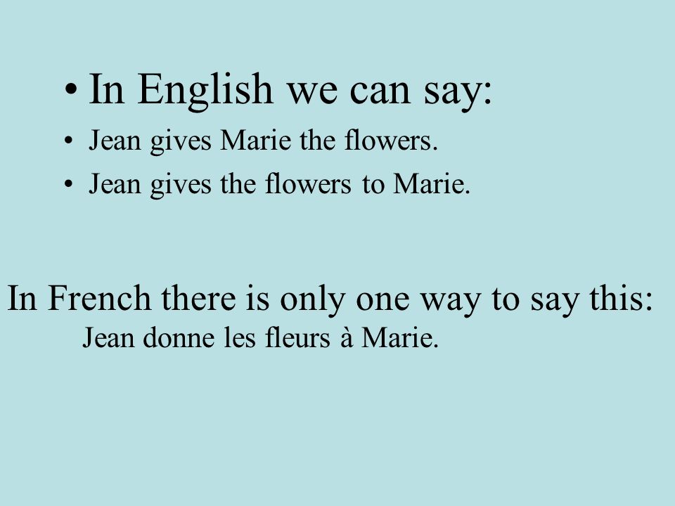 In English we can say: Jean gives Marie the flowers.